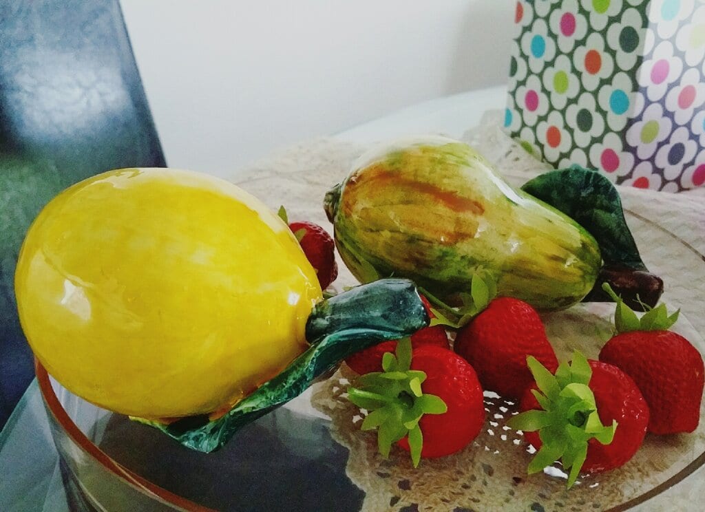 Ceramic lemon and pears from Amalfi and plastic strawberries from Seattle.a76ef047d8d24c03823acdf41c4ee7c8.jpg